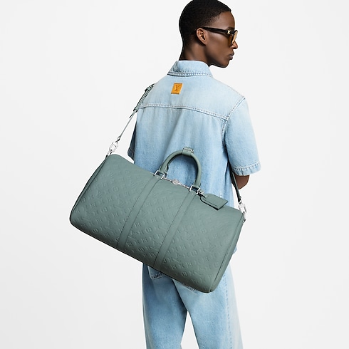 Keepall Bandoulière 50 Taurillon Monogram in Bags and Small Leather Goods's Men Bags Newness collections by Louis Vuitton (Product zoom)