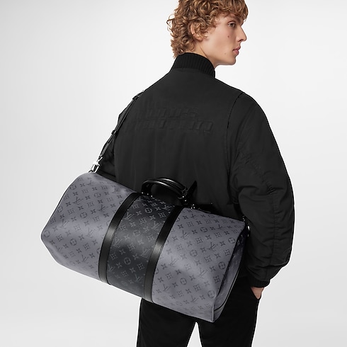 Keepall Bandoulière 50 Monogram Eclipse in Men's Travel Men's Duffle and Travel Bags collections by Louis Vuitton (Product zoom)