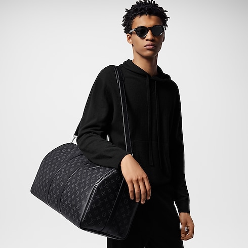 Keepall Bandoulière 55 Monogram Eclipse in Men's Travel All Luggage and Accessories collections by Louis Vuitton (Product zoom)