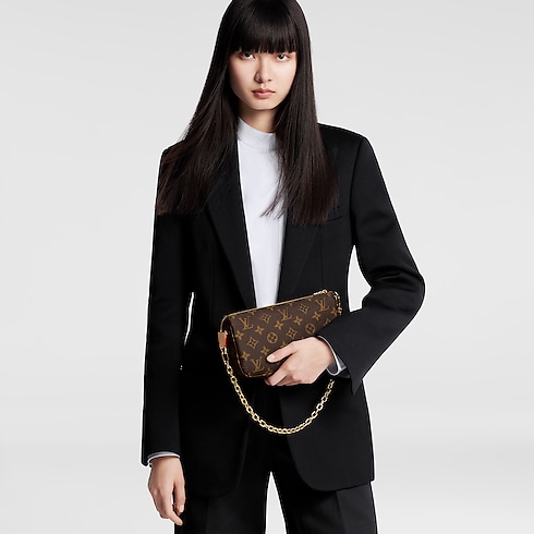 Pochette Accessoires Monogram in Women's Wallets and Small Leather Goods Wallets on Chain and Micro Bags collections by Louis Vuitton (Product zoom)