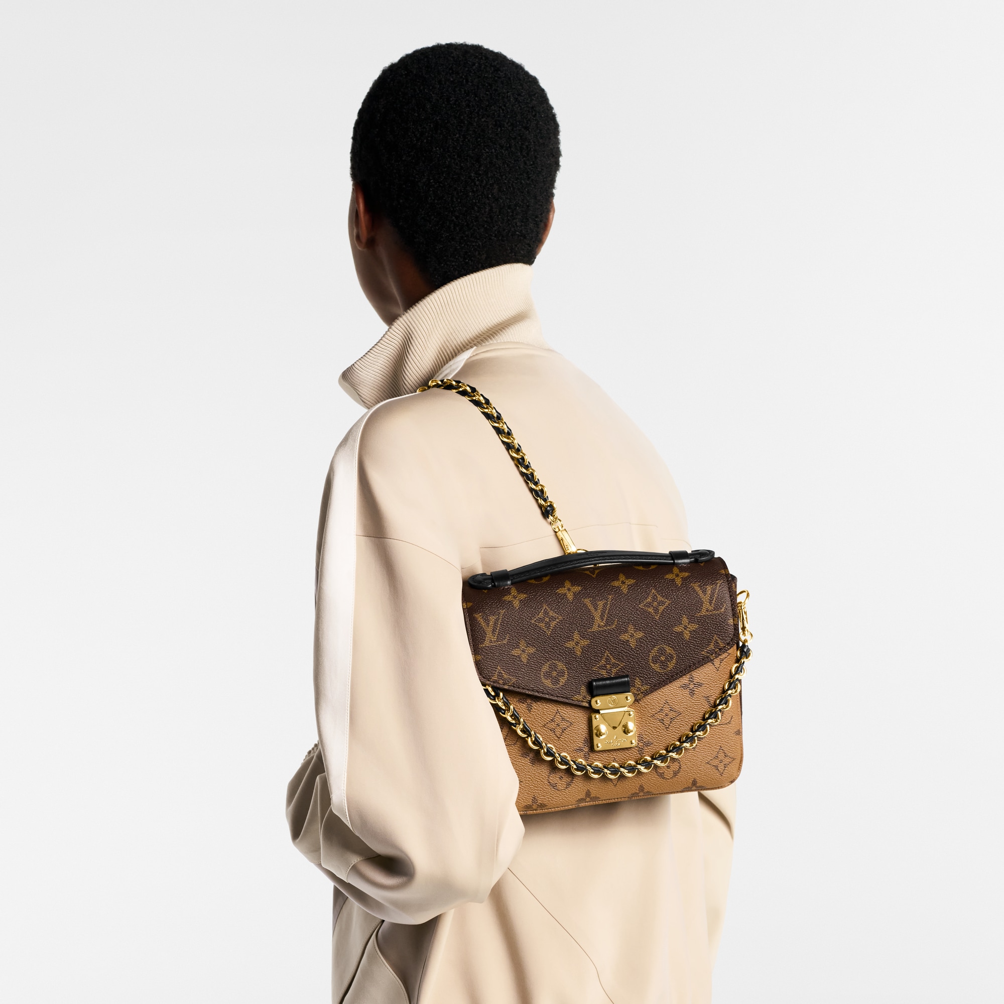 Pochette Métis Backpack Monogram Reverse Canvas in Women