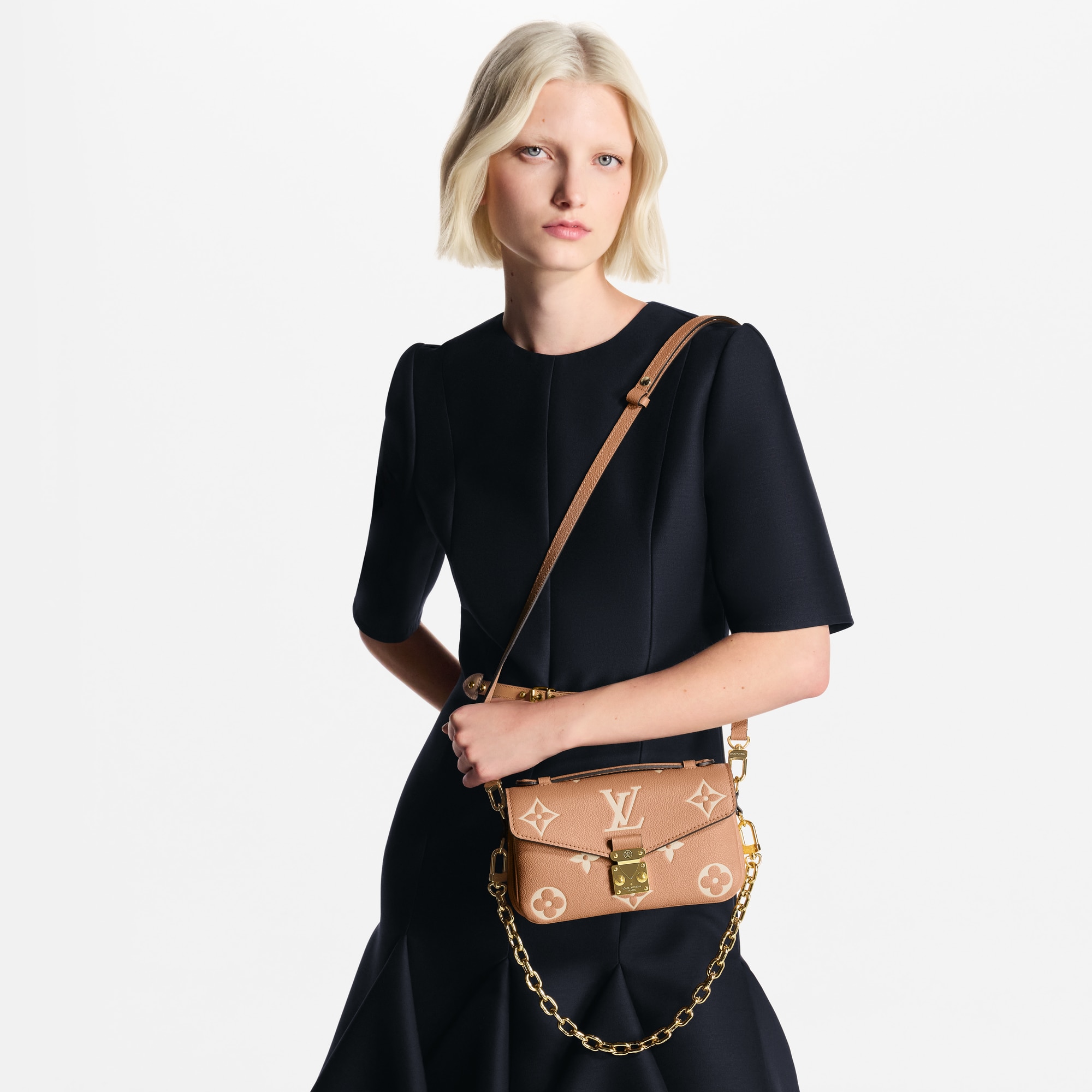 Pochette Métis East West Monogram Empreinte in Women